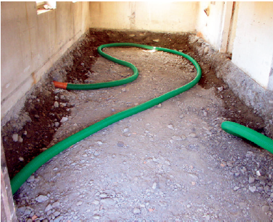 mises en œuvre d’un drainage sous dalle en rénovation